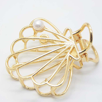 Gold-tone metal hair claw clips in several shapes
