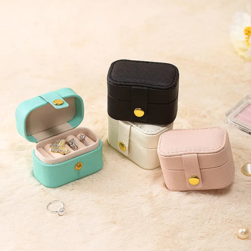 Aqua, black, cream and pink mini ring travel cases