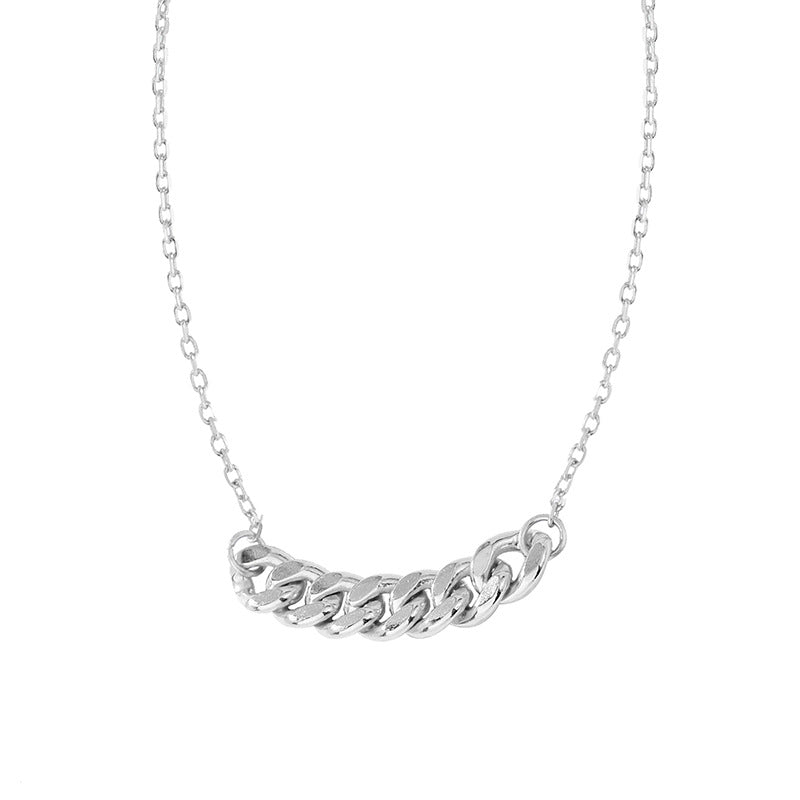 Silver-tone curb chain bar necklace on a white background