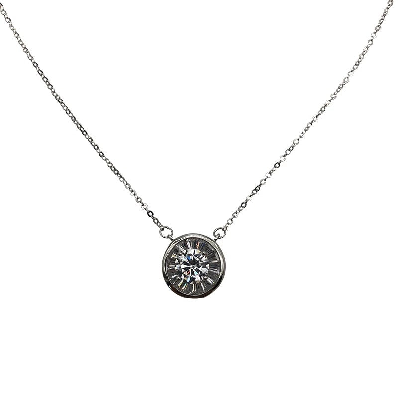 Silver-tone circle pendant necklace with a clear zircon center stone on a fine chain