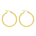 Pair of gold-tone textured hoop earrings with latch-back closures, white background