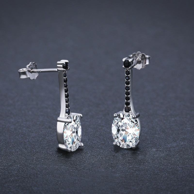Side view of the oval zircon bar drop earrings showing the post backs