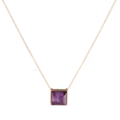 Purple square pendant in a gold-tone frame on a fine gold-tone chain, white background