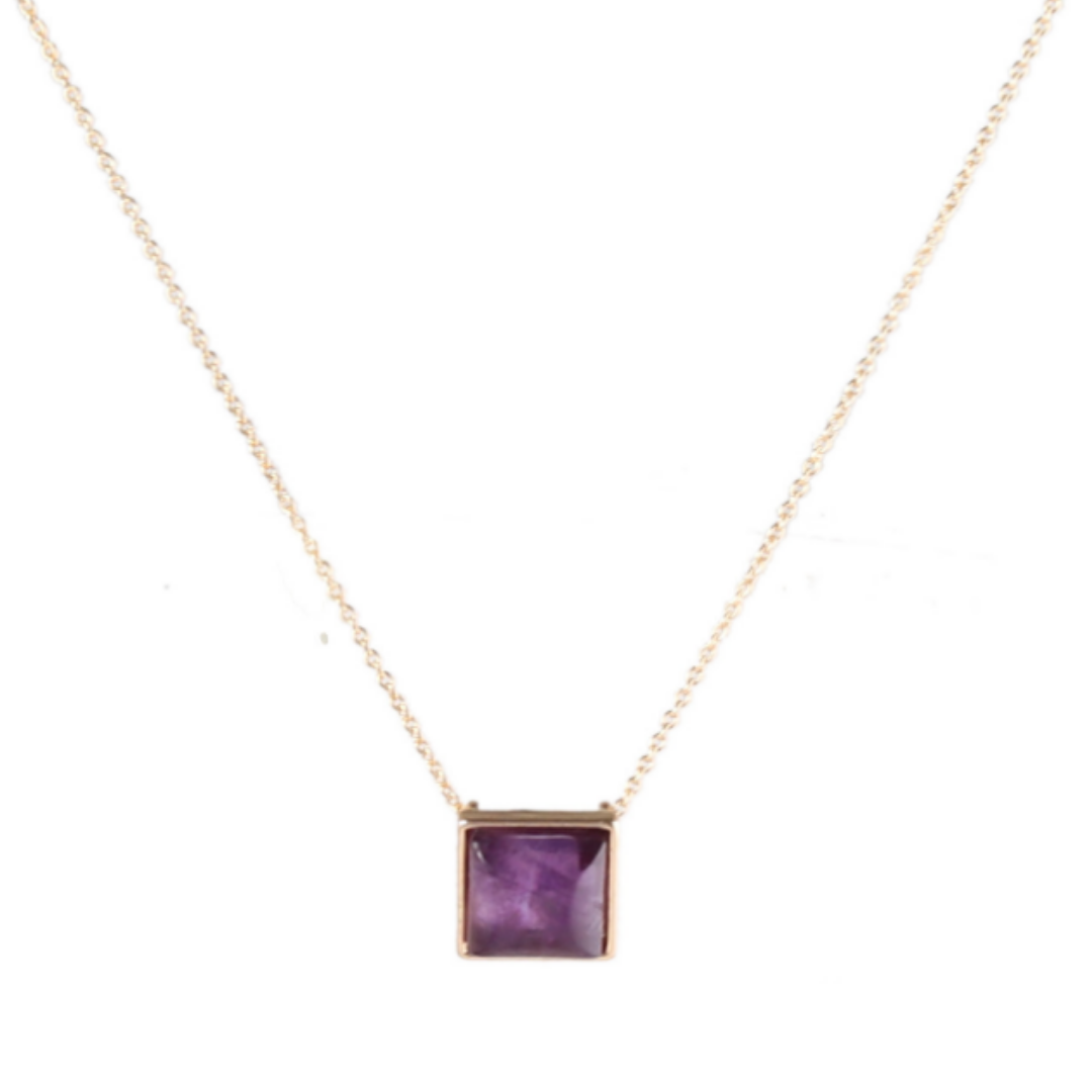 Purple square pendant in a gold-tone frame on a fine gold-tone chain, white background